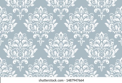 Wallpaper in the style of Baroque. Seamless vector background. White and blue floral ornament. Graphic pattern for fabric, wallpaper, packaging. Ornate Damask flower ornament