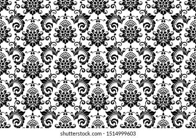 Wallpaper in the style of Baroque. Seamless vector background. White and black floral ornament. Graphic pattern for fabric, wallpaper, packaging. Ornate Damask flower ornament