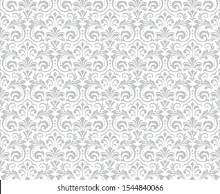 Wallpaper in the style of Baroque. Seamless vector background. White and grey floral ornament. Graphic pattern for fabric, wallpaper, packaging. Ornate Damask flower ornament.