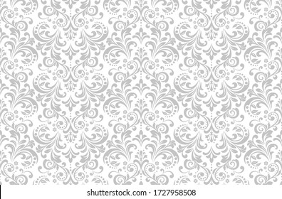 Wallpaper in the style of Baroque. Seamless vector background. White and grey floral ornament. Graphic pattern for fabric, wallpaper, packaging. Ornate Damask flower ornament.