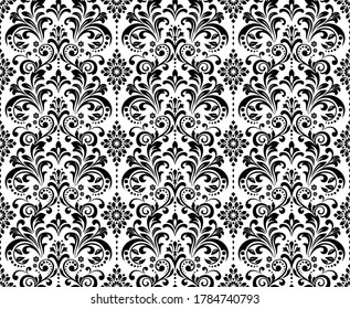 Wallpaper in the style of Baroque. Seamless vector background. White and black floral ornament. Graphic pattern for fabric, wallpaper, packaging. Ornate Damask flower ornament