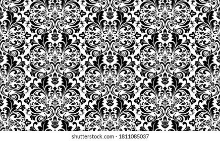Tapete im Barockstil. Nahtloser Vektorhintergrund. Weiße und schwarze Blumenschmuck. Grafisches Muster für Gewebe, Tapeten, Verpackung. Blütendekoration von Ornate Damast