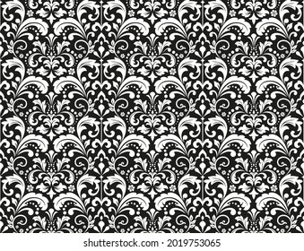 Wallpaper in the style of Baroque. Seamless vector background. White and black floral ornament. Graphic pattern for fabric, wallpaper, packaging. Ornate Damask flower ornament