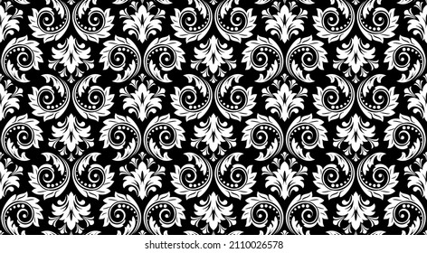 Wallpaper in the style of Baroque. Seamless vector background. White and black floral ornament. Graphic pattern for fabric, wallpaper, packaging. Ornate Damask flower ornament