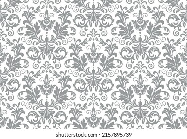 Wallpaper in the style of Baroque. Seamless vector background. White and gray floral ornament. Graphic pattern for fabric, wallpaper, packaging. Ornate Damask flower ornament.