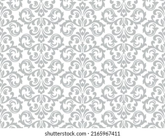 Wallpaper in the style of Baroque. Seamless vector background. White and gray floral ornament. Graphic pattern for fabric, wallpaper, packaging. Ornate Damask flower ornament.