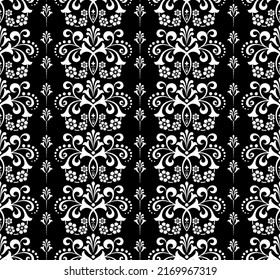 Wallpaper in the style of Baroque. Seamless vector background. White and black floral ornament. Graphic pattern for fabric, wallpaper, packaging. Ornate Damask flower ornament
