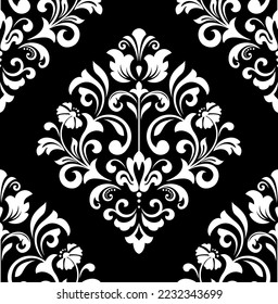 Wallpaper in the style of Baroque. Seamless vector background. White and black floral ornament. Graphic pattern for fabric, wallpaper, packaging. Ornate Damask flower ornament