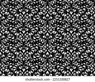Wallpaper in the style of Baroque. Seamless vector background. White and black floral ornament. Graphic pattern for fabric, wallpaper, packaging. Ornate Damask flower ornament