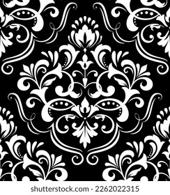 Wallpaper in the style of Baroque. Seamless vector background. White and black floral ornament. Graphic pattern for fabric, wallpaper, packaging. Ornate Damask flower ornament