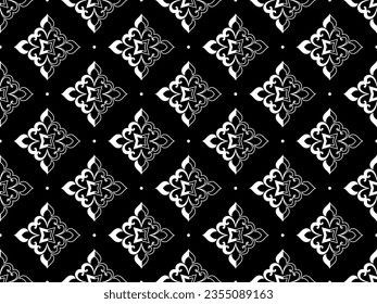 Wallpaper in the style of Baroque. Seamless vector background. White and black floral ornament. Graphic pattern for fabric, wallpaper, packaging. Ornate Damask flower ornament