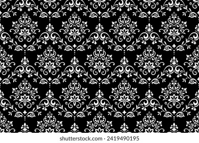 Wallpaper in the style of Baroque. Seamless vector background. White and black floral ornament. Graphic pattern for fabric, wallpaper, packaging. Ornate Damask flower ornament