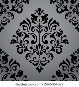 Wallpaper in the style of Baroque. Seamless vector background. White and black floral ornament. Graphic pattern for fabric, wallpaper, packaging. Ornate Damask flower ornament.