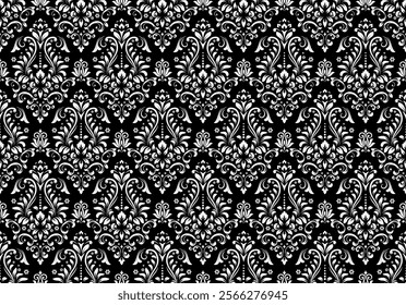 Wallpaper in the style of Baroque. Seamless vector background. White and black floral ornament. Graphic pattern for fabric, wallpaper, packaging. Ornate Damask flower ornament.