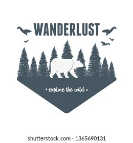 wanderlust label with forest scene and grizzly bear