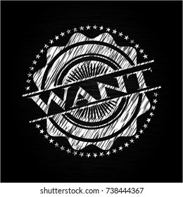 Want chalkboard emblem written on a blackboard