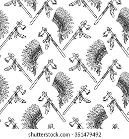 

War bonnet, Tomahawk, feather birds. Ethnic seamless pattern vector illustration.
