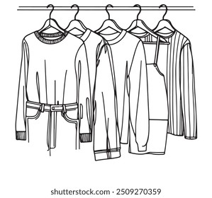 Wardrobe sketch. Clothes on the hangers. Hand drawn illustration