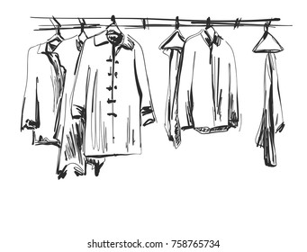 Wardrobe sketch. Clothes on the hangers. Hand drawn illustration