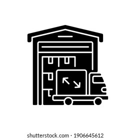 Warehouse facilities black glyph icon. Freight trucking business, commercial shipping services silhouette symbol on white space. Cargo storage building and delivery van. Vector isolated illustration