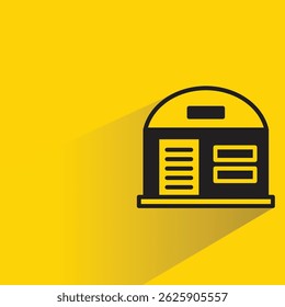 Icono de almacén con sombra sobre fondo amarillo