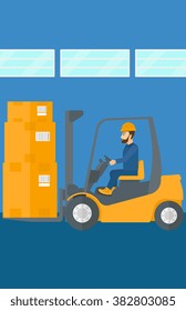 Warehouse worker moving load by forklift truck.