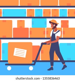 warehouse worker in uniform pulling trolley hand truck with cardboard box african american man working modern logistic storage industry commercial business concept horizontal flat