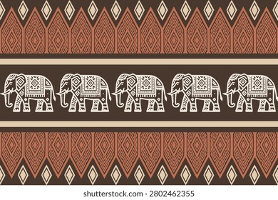 A Warli-inspired tribal border illustration featuring a row of decorated elephants surrounded by geometric tribal ornaments and traditional ethnic motifs in a seamless horizontal composition. The warm earthy color palette of terracotta, brown, beige, and cream reflects the handcrafted beauty of indigenous folk art. This decorative illustration is ideal for textile and fabric printing, wallpaper, gift wrap, stationery, packaging, home décor, scrapbook projects, surface pattern design, cultural publications, and commercial stock artwork. Clean, balanced, and highly versatile for both traditional and contemporary design applications.