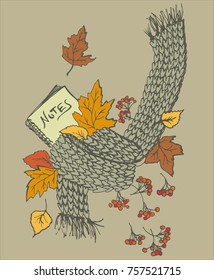 Warm autumn illustration with a knitted scarf, notepad and berries.