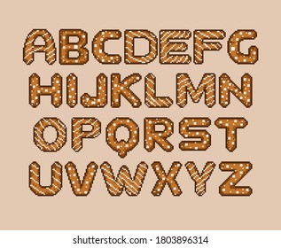 Warm delicious baked cookies in the old pixel style as isolated letters. 8 bit glazed alphabet for cooking video games, posters, notebooks. Crispy sweets for holidays and parties.