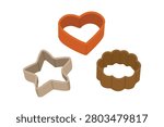 Warm flat vector set of heart, star, and scalloped cookie cutters for baking.