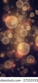 Warmer goldener Bokeh-Hintergrund mit weich leuchtenden Kreisen.