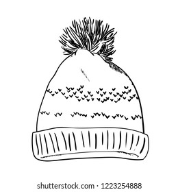 Warm hat with pompon. Sketch vector illustrations isolated on white background. Hand drawn woolen hat with a fluffy pompom. Winter accessory. Knitted clothes.