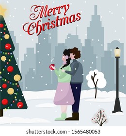 Warm hugs of a guy and a girl in a winter city park