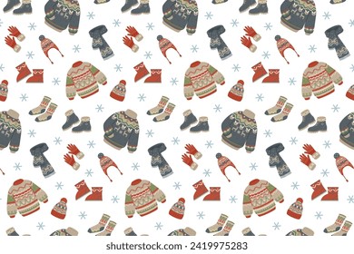 Warm knitted clothing seamless pattern.Sweater and hat, scarf and socks.Cozy winter.Textile and fabric, wrapping.Vector stock illustration.