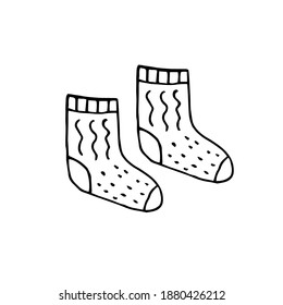 Warm knitted socks. Vector hand drawn doodle illustration. Black and white outline. Coloring.	