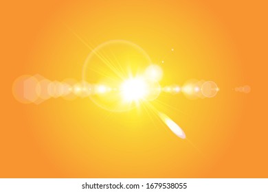 Warm sun on a yellow background. Summer. Glare. Solar rays.