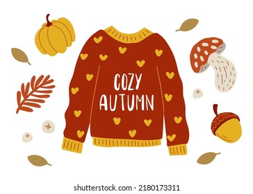 Warm sweater with lettering Cozy autumn. warm clothes, pumpkin, autumn leaf fall, mushrooms and acorn. Fall and warm clothes