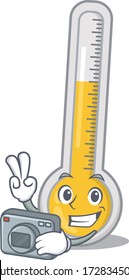 Warm thermometer mascot design as a professional photographer working with camera