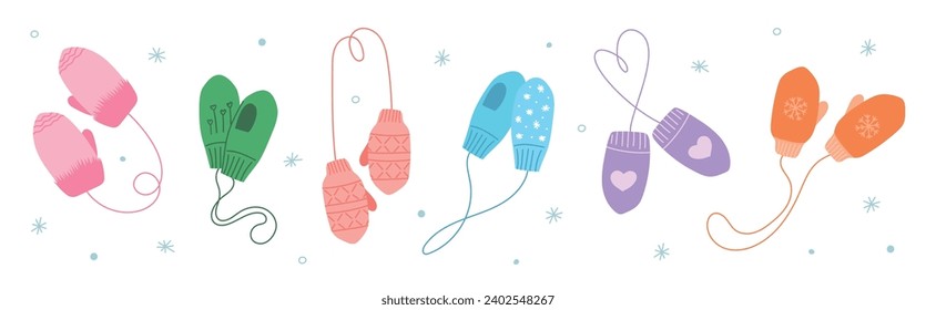Warm winter children mittens set. Cute hand drawn elements for winter design. Woolen or knitted mittens for cold frosty weather isolated on white background. Set of winter сhildish accessories.
