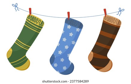 Warm winter clothes, cotton socks, wool fashion textile. Striped and star collection. Set of comfortable cute fabric. Drying clothes on rope. White background. Vector illustration