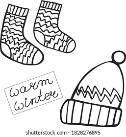Warm winter images - socks and hat isolated elements. Vector black-white illustrationon white background