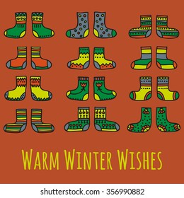 Warm Winter Wishes vector illustration. Set of colorful socks with different patterns 