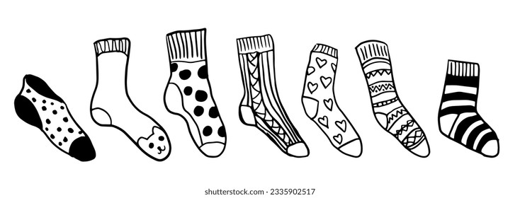 Warm winter woolen socks set. Vector hand drawn doodle illustration of cozy winter socks. Elements for flyer, label, logo design.