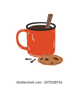 Warming drink with cinnamon stick and chocolate chip cookie in a red enamel mug