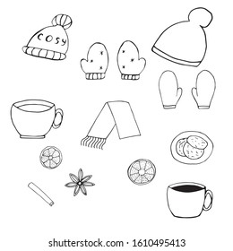 A warming set of winter clothing items and hot drinks and spices