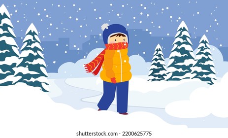 warmly dressed boy in winter in the forest