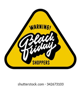 Warning Black Friday Shoppers! Funny Yellow and Black Plate, triangular Road Sign, t shirt graphics, humorous print design. Hand Made Digitized Brush Lettering. Vector Illustration.