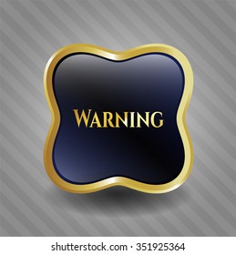 Warning gold emblem or badge