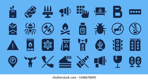 warning icon set. 32 filled warning icons. on blue background style Collection Of - Cigarettes, Cigarette, Alert, Parking sign, Safety glasses, Spider, Fire, Skull, Weapon, Bomb